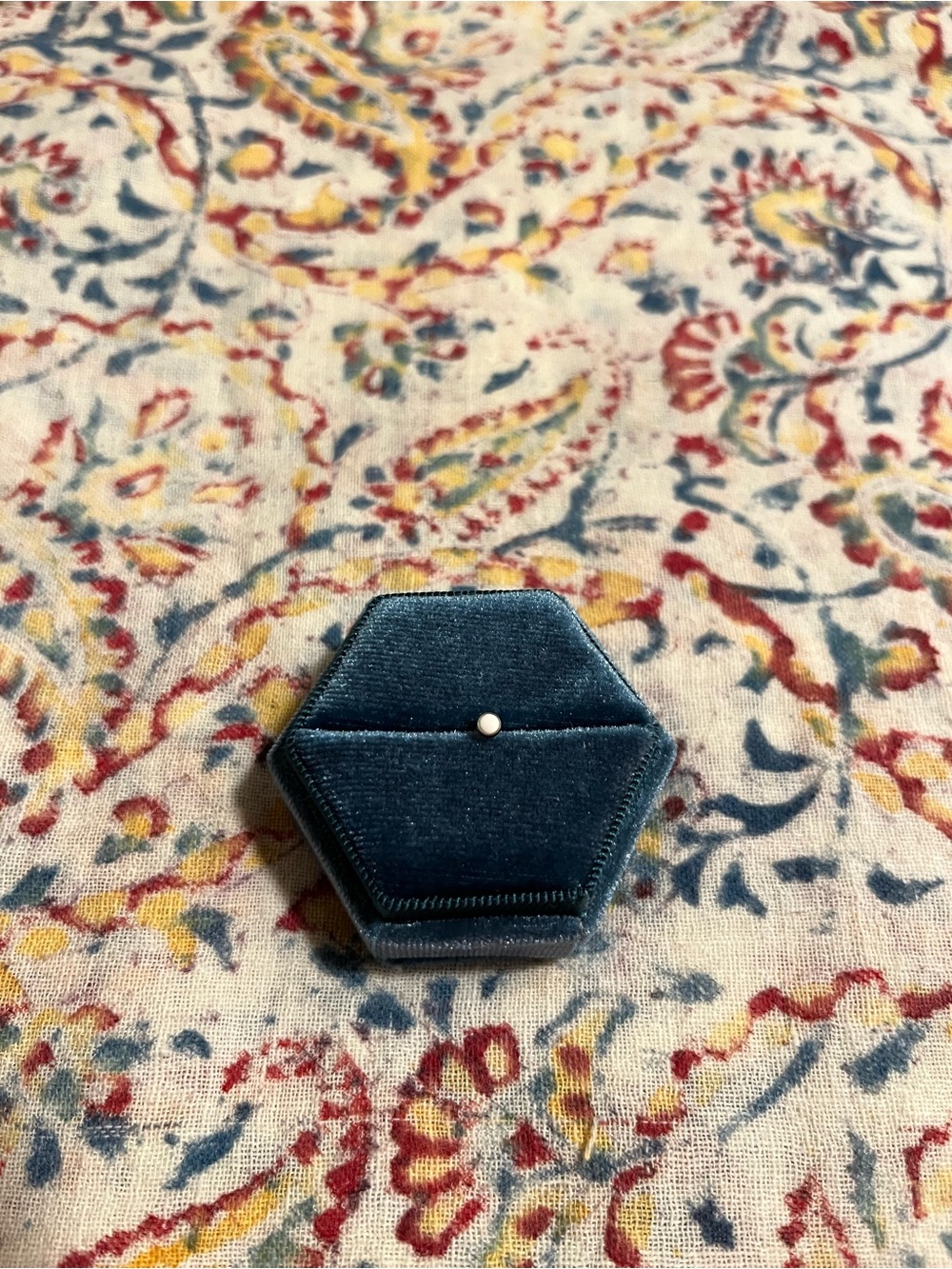 First time piercing earring-small white bezel, titanium, threadless. Adorn East.